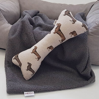 Bassotto di peluche a forma di osso Toni