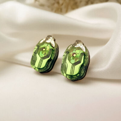 Green Rose Chafer Stud Earrings laser cut from mirror acrylic with tiny rainbow rhinestone