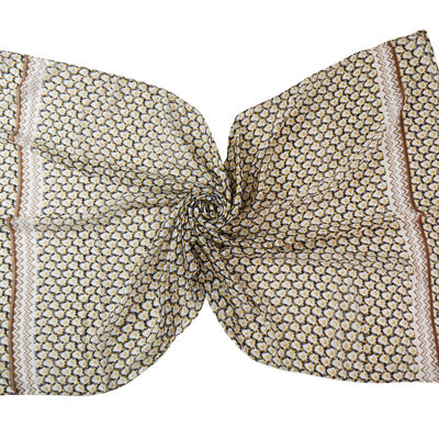 Scarf with repeating geometric patterns