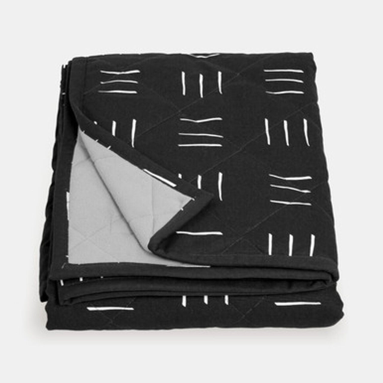 Couverture écologique pour animaux Molly Mutt – Rêves (traces blanches sur fond noir) | Lavable, envers polaire, matelassée, 100 % coton non toxique, 2 tailles