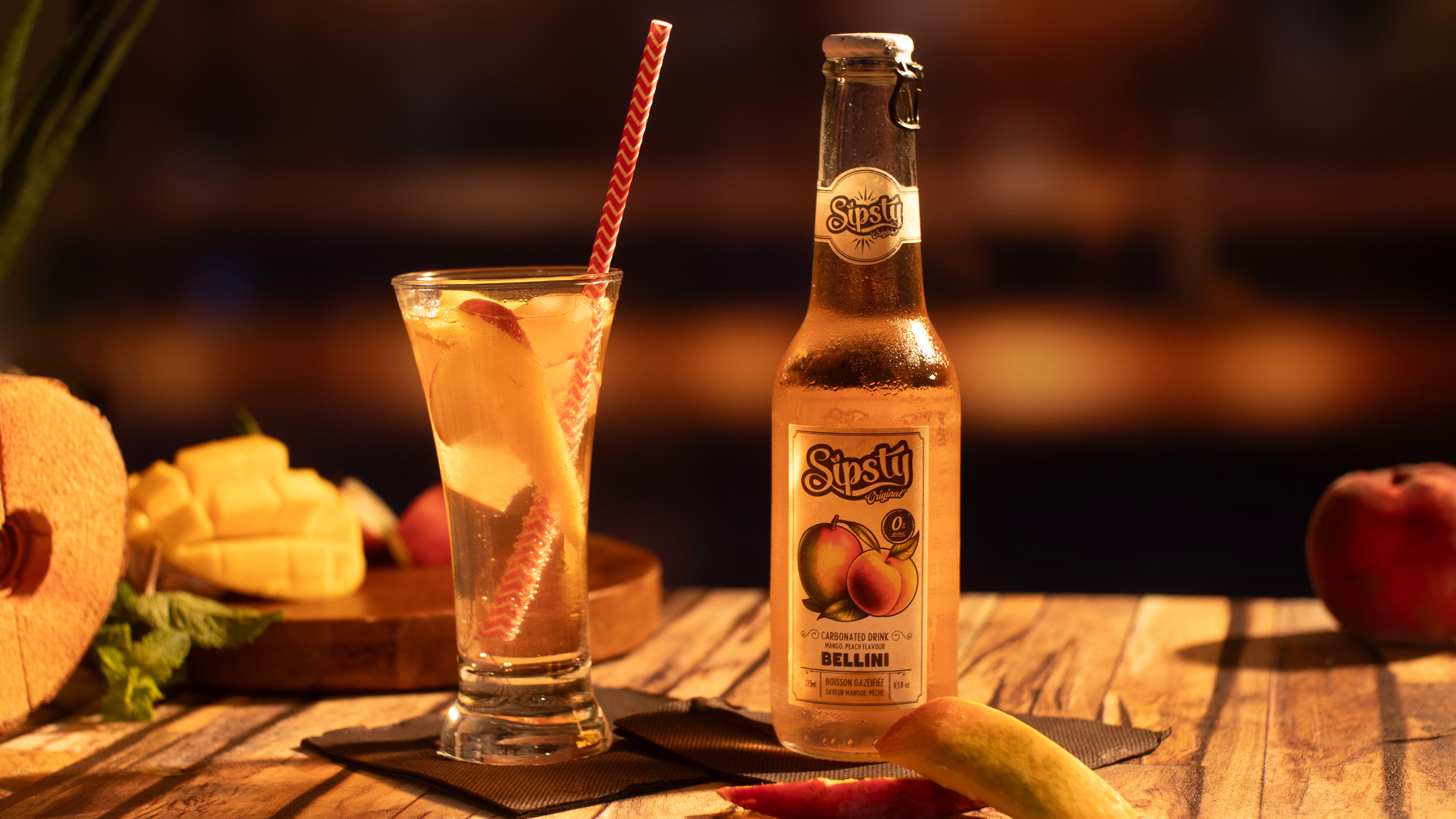 Sipsty Bellini, la boisson pétillante sans alcool à la mangue et à la pêche. Un soda fruité et élégant, parfait pour célébrer sans modération.