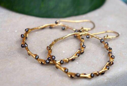 Large Gold hoop earrings for women. Gold twig & black rhodiu