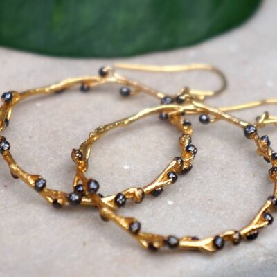 Large Gold hoop earrings for women. Gold twig & black rhodiu