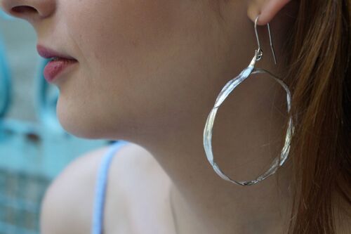 Sterling silver hoop earrings from Olive Leaves.