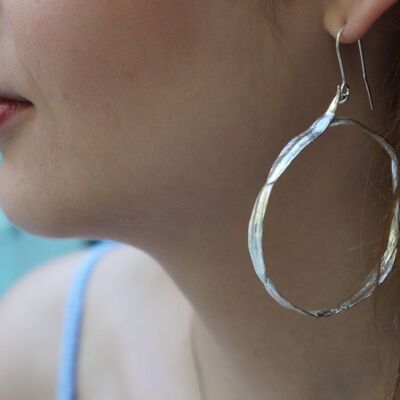 Sterling silver hoop earrings from Olive Leaves.