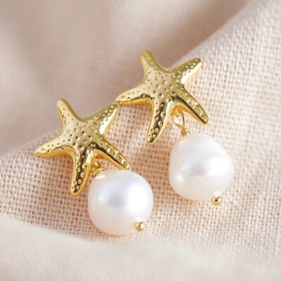 Aretes de perlas de agua dulce con estrella de mar en oro con postes de plata de ley