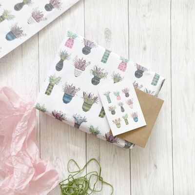 Papel de regalo de lujo con macetas estampadas