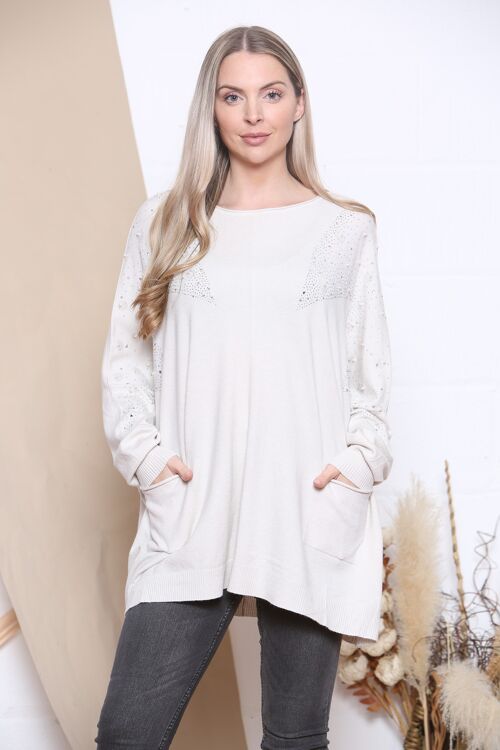 Beige Oversized jumper with raw edged round neckline and elongated cuffed sleeves.