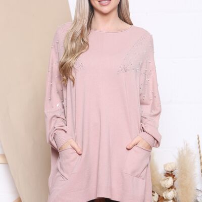 Pink Oversized jumper with raw edged round neckline and elongated cuffed sleeves.
