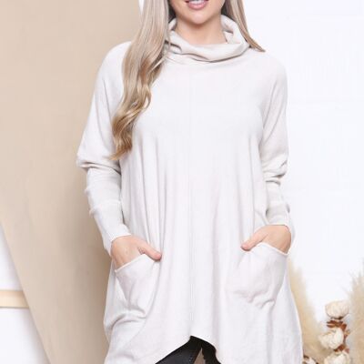 Beige Loose fit elongated jumper with soft roll neck and front pockets.