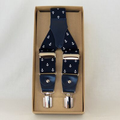 Bracelet élastique avec ancres blanches, fond bleu marine.