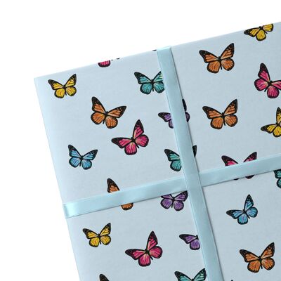 2 hojas de papel de regalo azul mariposa