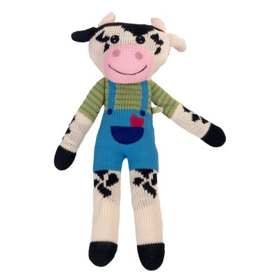 Knitted cow cuddly toy
