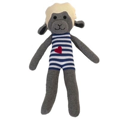 Knitted sheep cuddly toy