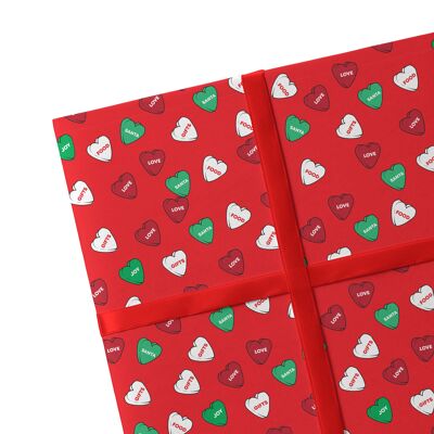 2 feuilles de papier cadeau coeurs de Noël rouge