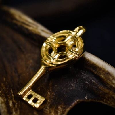 Réplica de llave de época vikinga chapada en oro