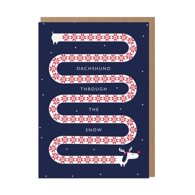 Teckel par la carte de Noël de chien de neige