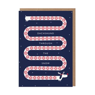 Dachshund a través de la tarjeta de Navidad de perro de nieve