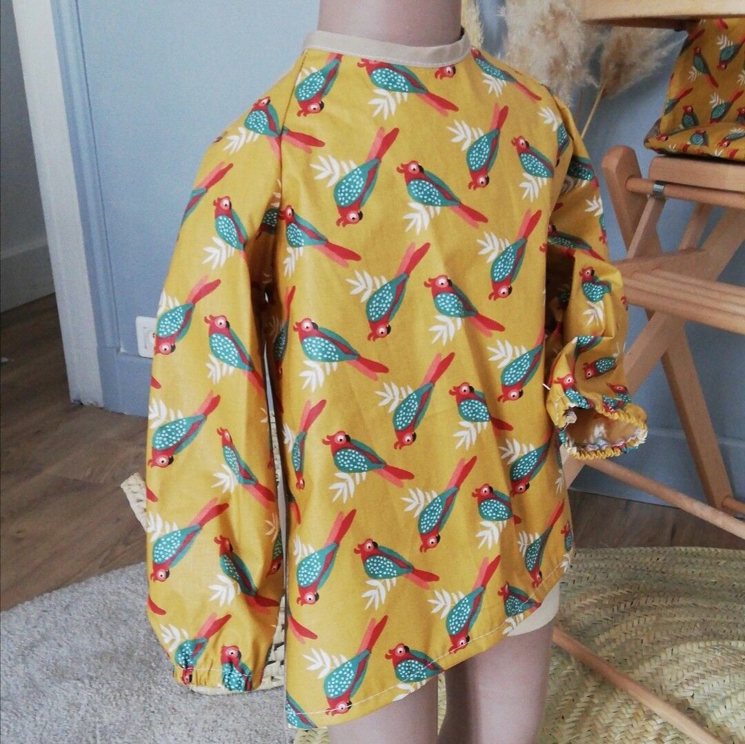 Bavaglino impermeabile in cotone spalmato Parrocchetto