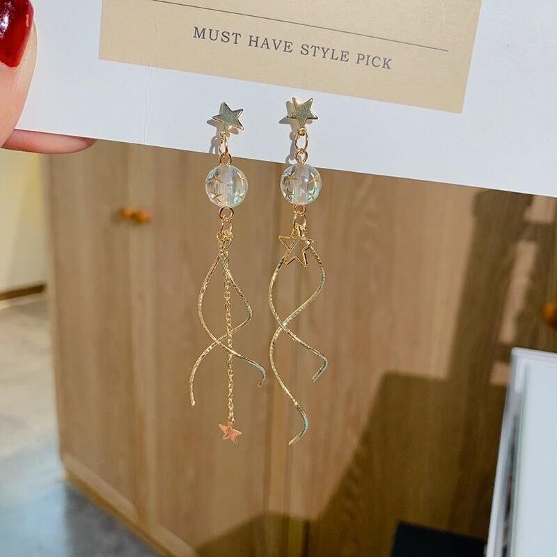 Orecchini con nappe ricci con stella con sfera di cristallo