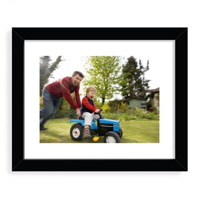 Father and son playing in backyard Designer Framed Art Print