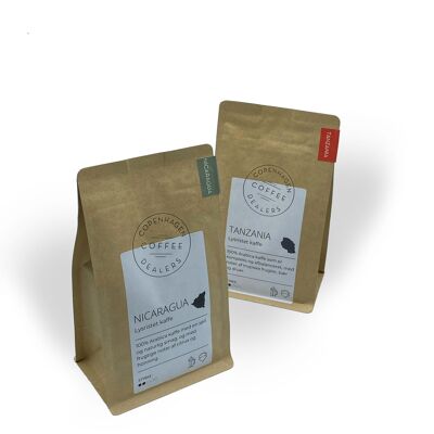 Confezione con 2x250g di caffè appena tostato. Chicchi di caffè tostati dalla Tanzania e dal Nicaragua. Fagioli interi