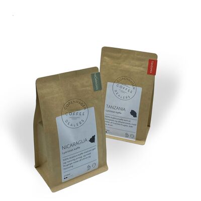Package with 2x250g freshly roasted coffee. Light roasted coffee beans from Tanzania & Nicaragua. Whole beans