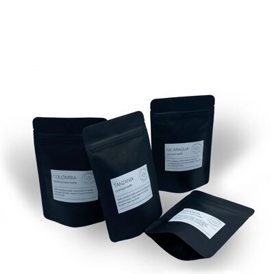 Confezione regalo con 4x70 g di caffè appena tostato. Chicchi di caffè a tostatura media provenienti dalla Colombia e dal Ruanda. Chicchi di caffè tostati dalla Tanzania e dal Nicaragua. Confezionato con 4x70 g. Fagioli interi