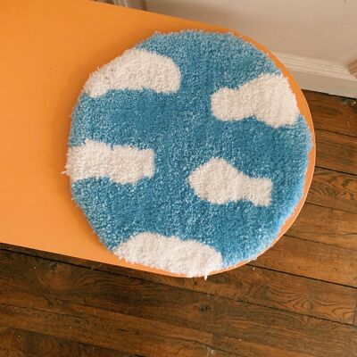 Round light blue cloud rug