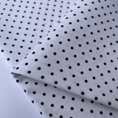White polka dot poplin fabric