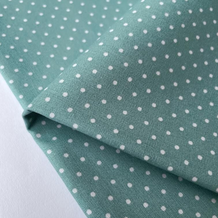 Tessuto popeline a pois turchese