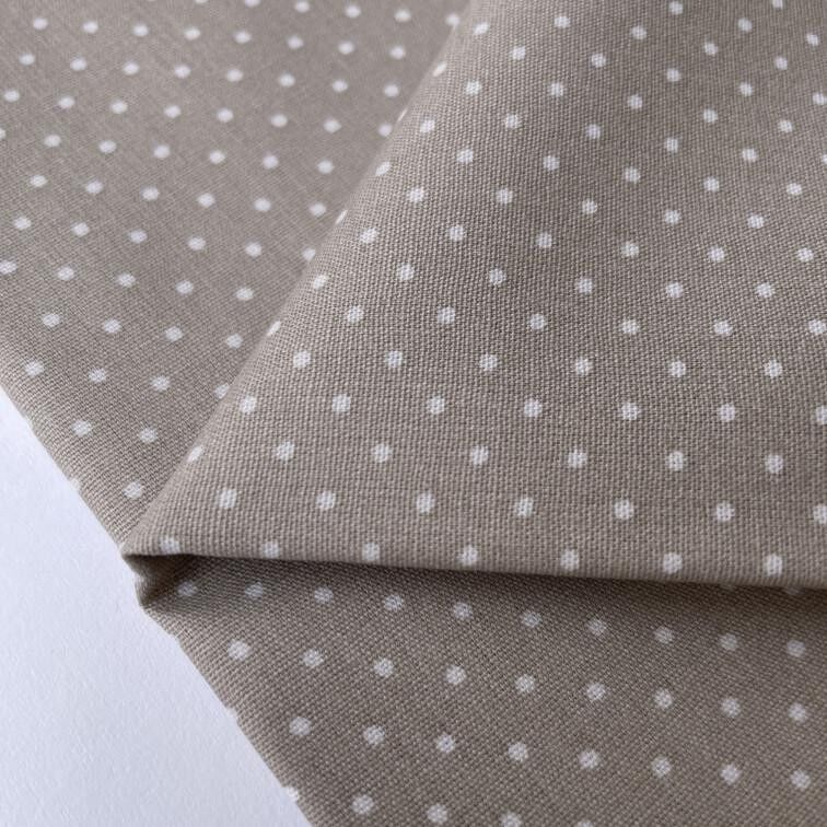 Tessuto popeline beige a pois