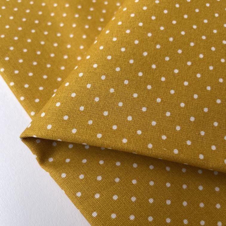 Tessuto popeline ocra a pois