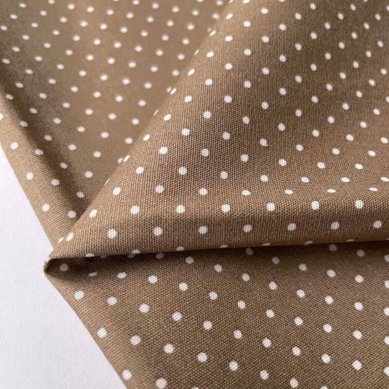 Tessuto popeline marrone chiaro a pois