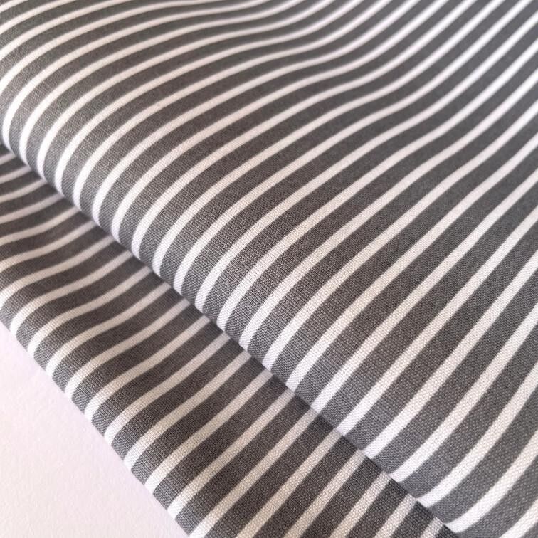 Tessuto popeline a righe grigio
