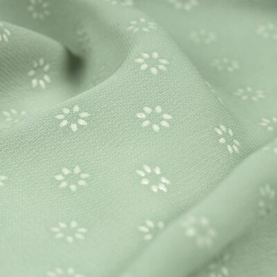 Chiffon fabric with little green flowers