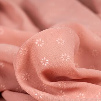 Tissu mousseline fleurs roses