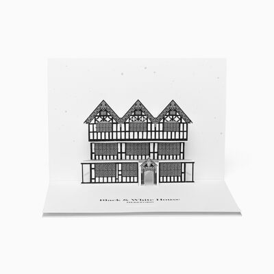 Tarjeta desplegable de saludos de la casa blanca y negra desde Hereford, color blanco