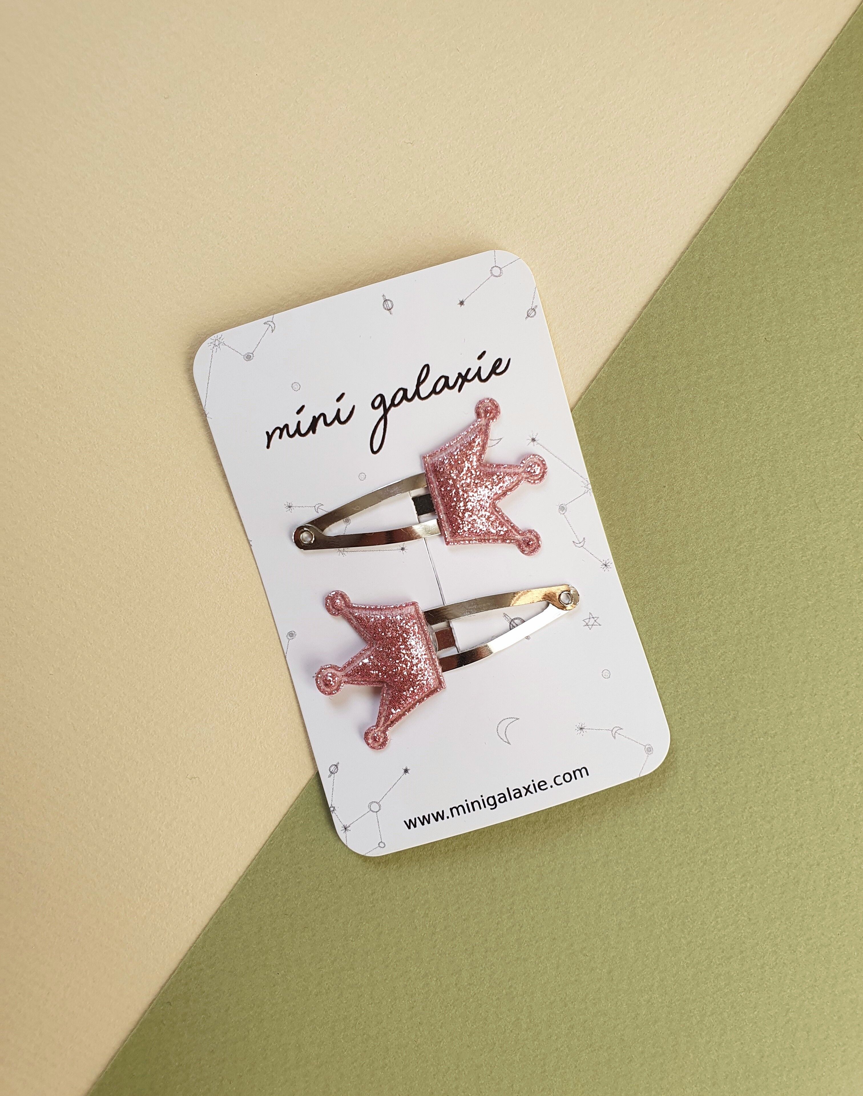 Pinzas para el pelo con purpurina corona rosa