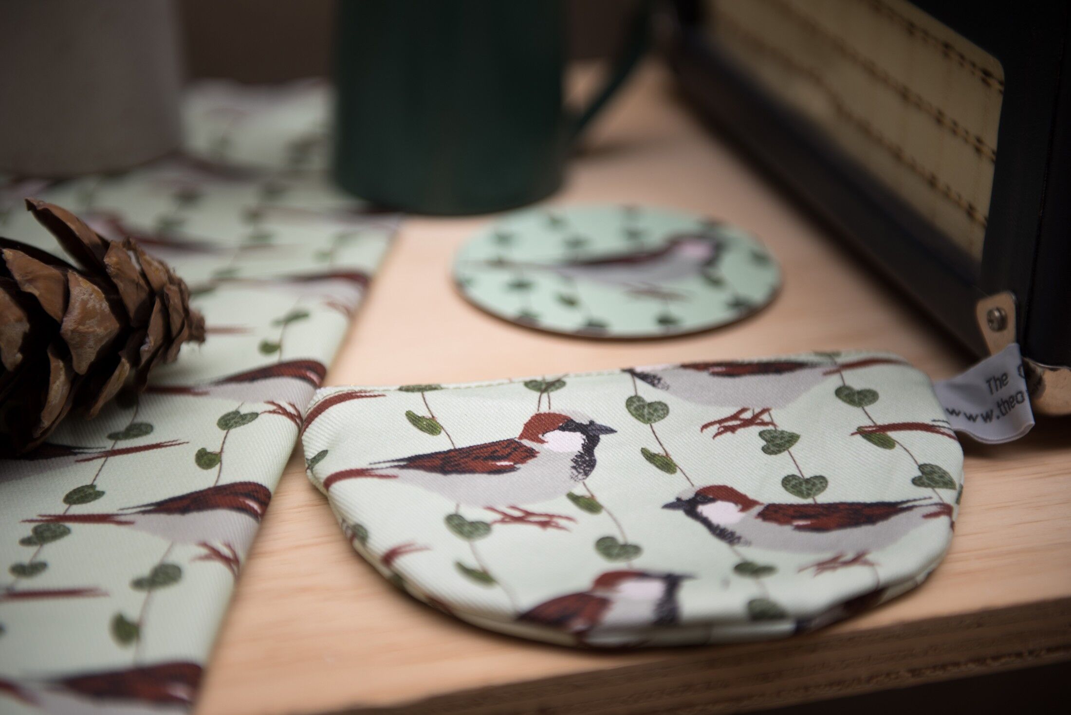 Portamonete con stampa passero