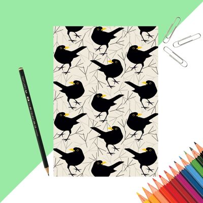 Cuaderno con estampado de mirlo