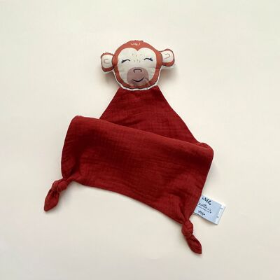 Monkey soft toy in terracotta red double gauze