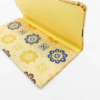 Japanese clutch with a handmade blue and brown rosette pattern with traditional clasp 3