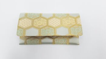 Japanese clutch with a handmade blue and brown rosette pattern with traditional clasp 8