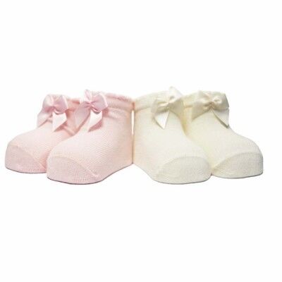 Calcetines de recién nacido - con lazo de raso blanco lana / rosa suave