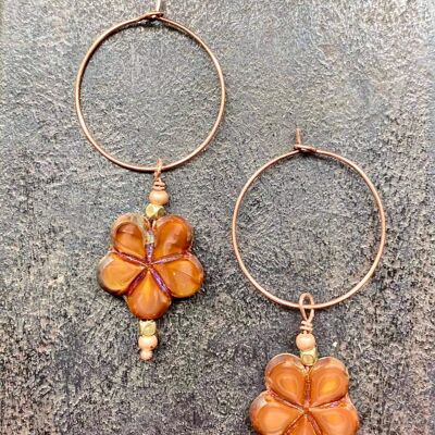 Boucles d'oreilles , 184