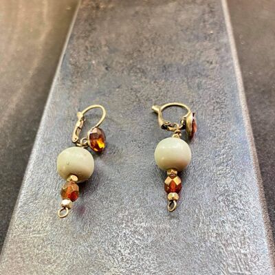 Boucles d'oreilles , 210