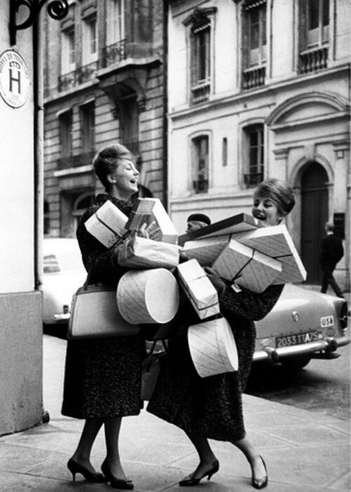 Two women shopping with boxes blank greetings card