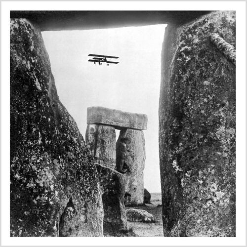 Biplane over Stonehenge square blank greetings card
