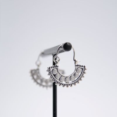 Crescent-shaped silver hoop earrings